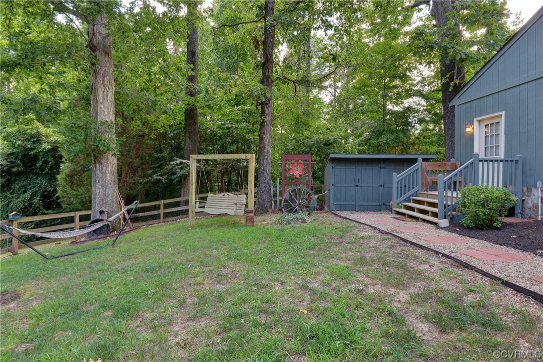 7317 Creighton Road Mechanicsville, VA 23111 - Photo 40 of 46 a front view of a house with garden