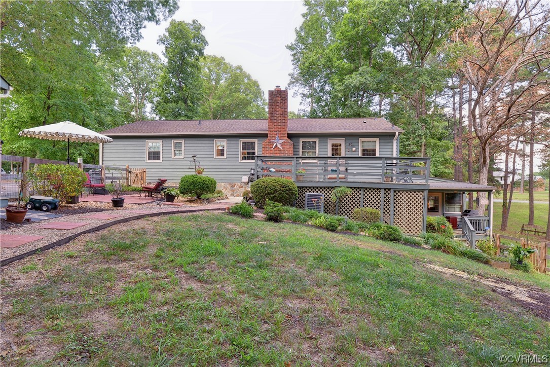 7317 Creighton Road Mechanicsville, VA 23111 - Photo 42 of 46 a front view of a house with garden