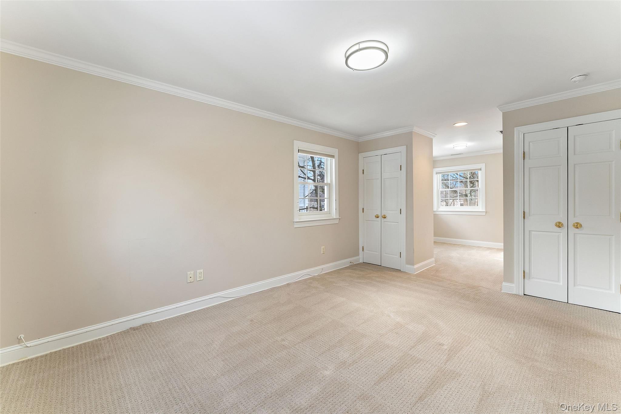 14 Wakefield Road Scarsdale, NY 10583 - Photo 19 of 27 Primary bedroom with 3 closets, bonus room and ensuite bathroom
