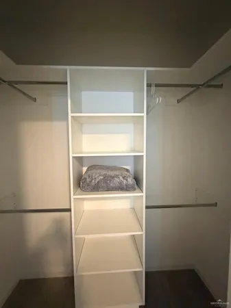 a view of walk in closet with window