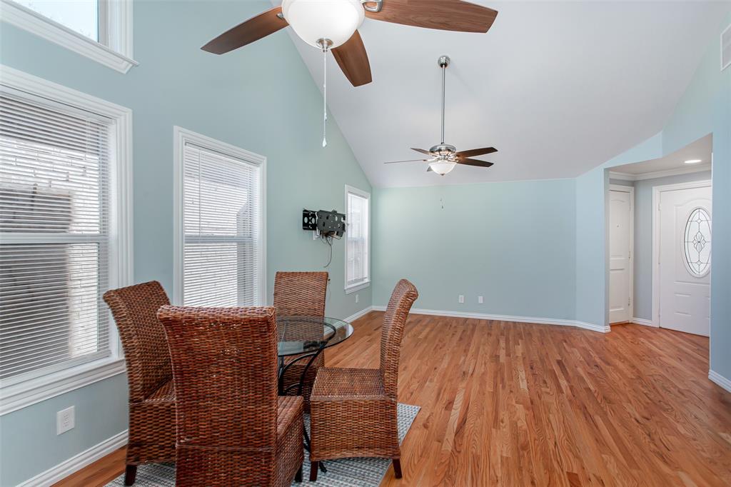 4139 Rosser Square Dallas, TX 75244 - Photo 11 of 34 Charming dining space with large windows that provide an abundance of natural light.