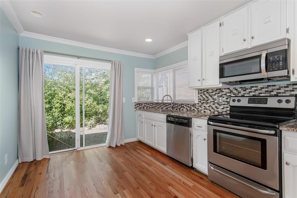 4139 Rosser Square Dallas, TX 75244 - Photo 18 of 34 A beautifully designed culinary space combining classic finishes, modern upgrades, and a thoughtful layout ideal for both daily living and entertaining.