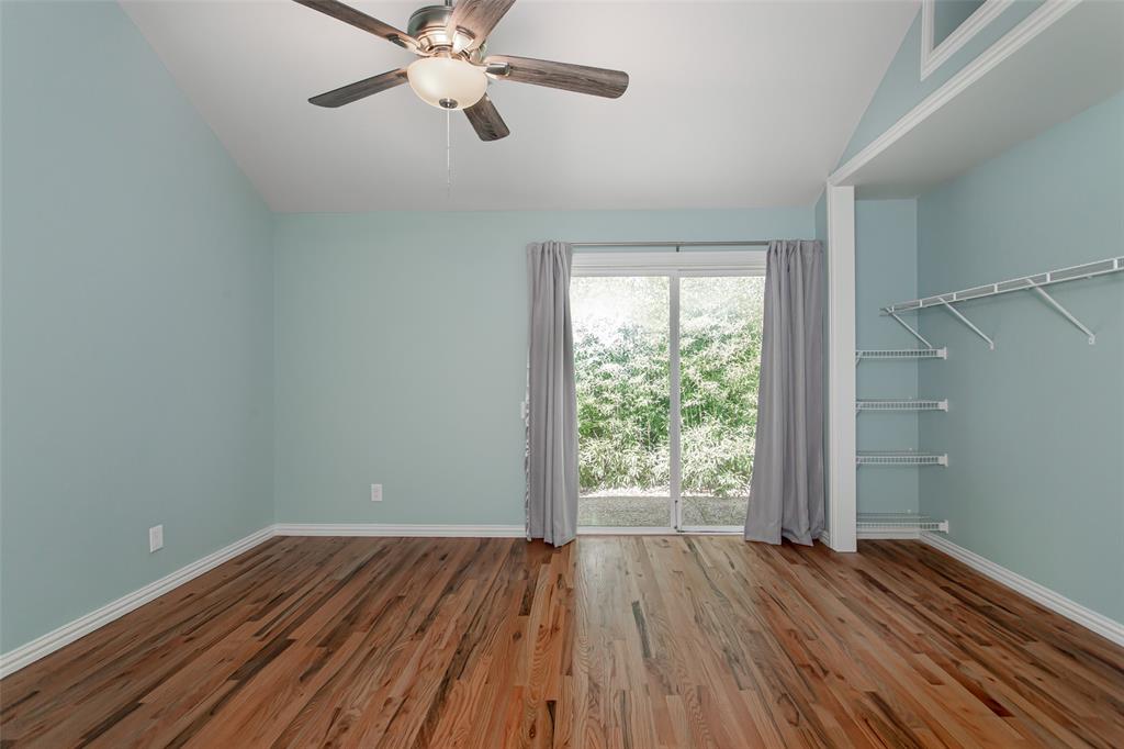 4139 Rosser Square Dallas, TX 75244 - Photo 22 of 34 Serene primary retreat with a sliding glass door providing direct access to a private patio and tranquil outdoor views.