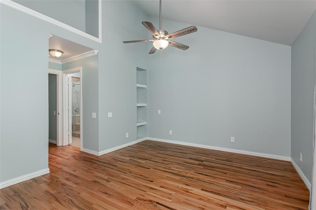 4139 Rosser Square Dallas, TX 75244 - Photo 24 of 34 Expansive primary bedroom featuring vaulted ceilings, custom paint, and a spacious layout designed for relaxation.