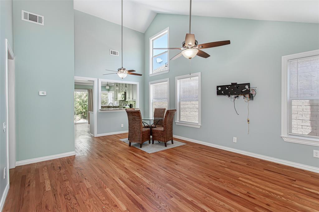 4139 Rosser Square Dallas, TX 75244 - Photo 7 of 34 Light-filled dining area, vaulted ceilings, oversized windows, and an airy, open feel.