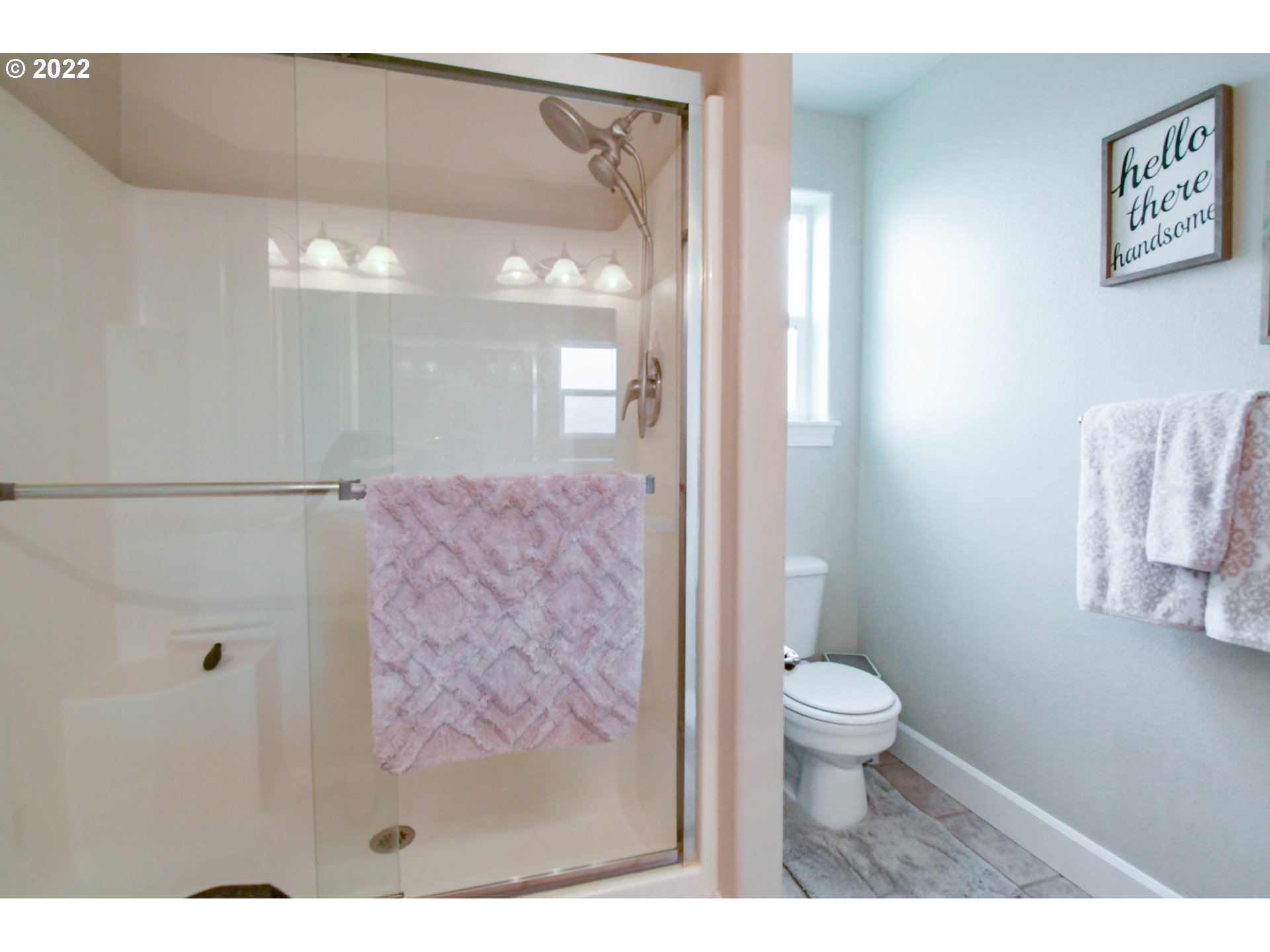 901 T Street Springfield, OR 97477 - Photo 14 of 29 a bathroom with a toilet sink and shower