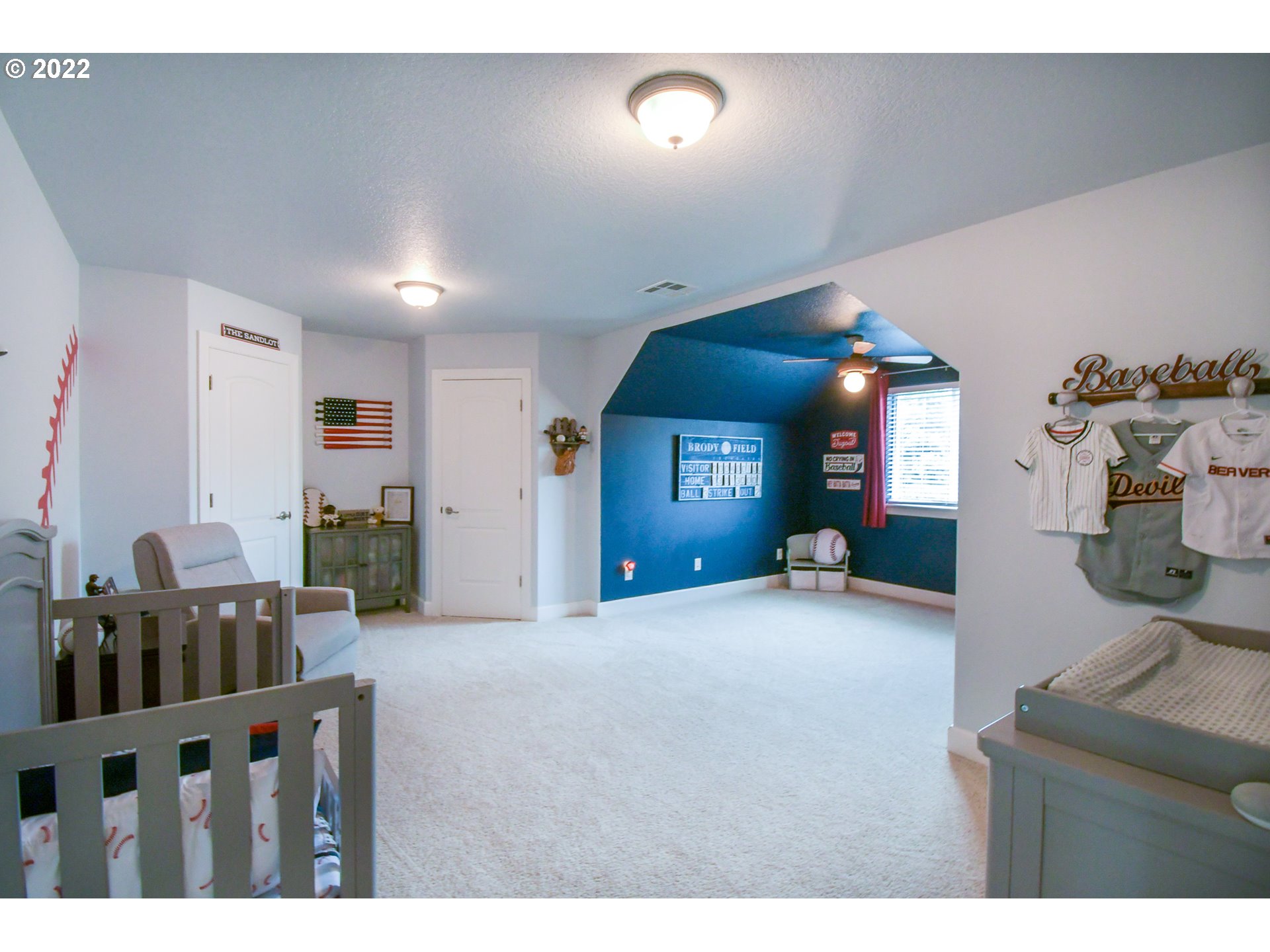 901 T Street Springfield, OR 97477 - Photo 15 of 29 a living room with furniture and a flat screen tv