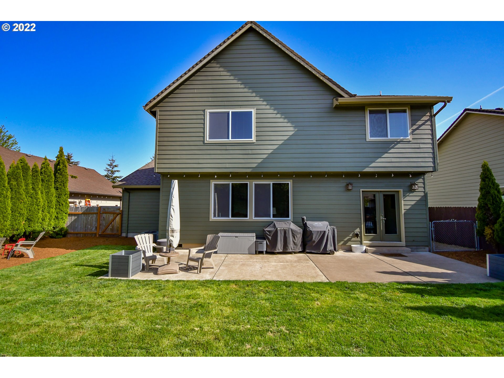 901 T Street Springfield, OR 97477 - Photo 21 of 29 a front view of a house with patio