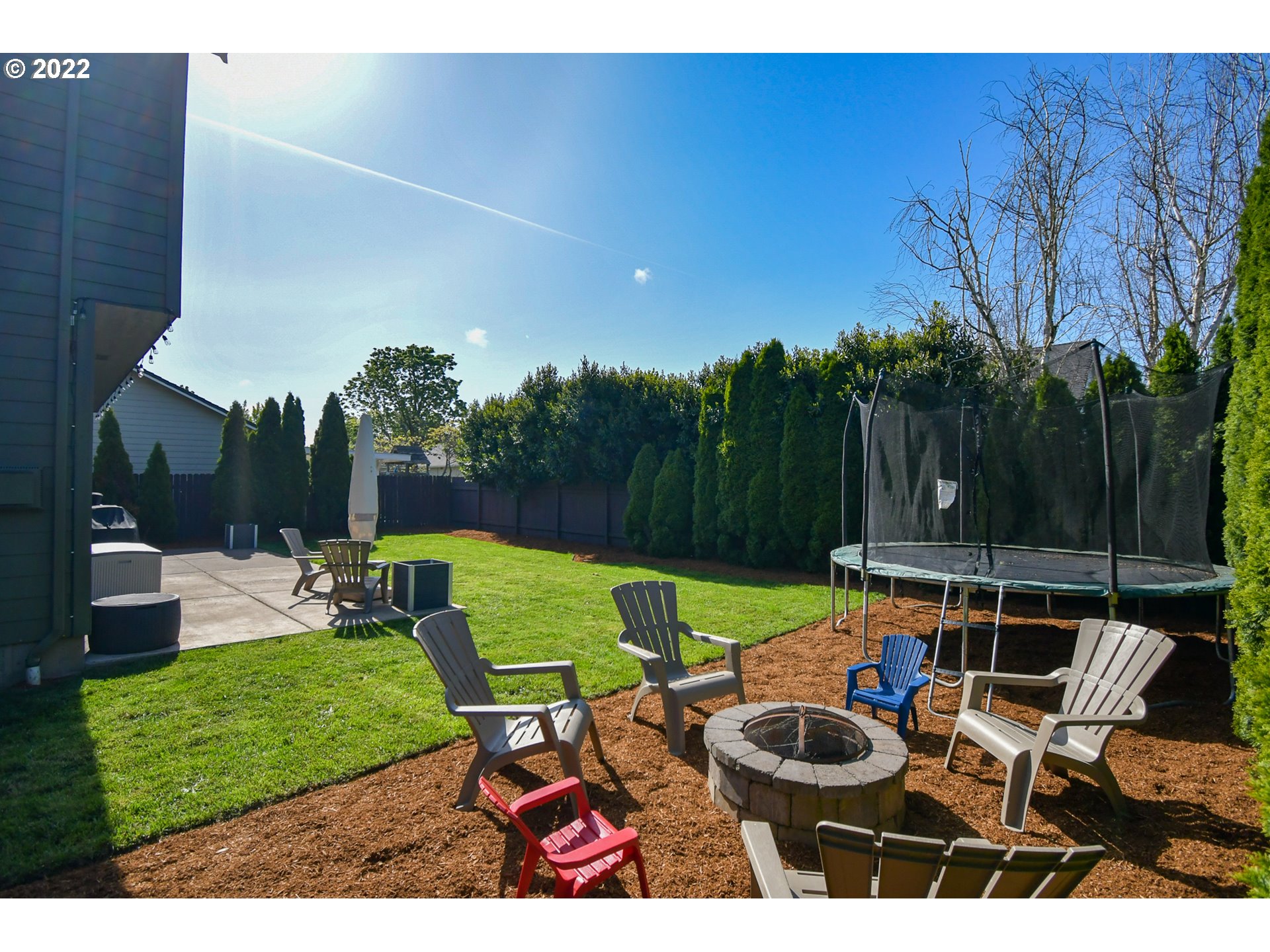 901 T Street Springfield, OR 97477 - Photo 25 of 29 a view of backyard with seating space and trees