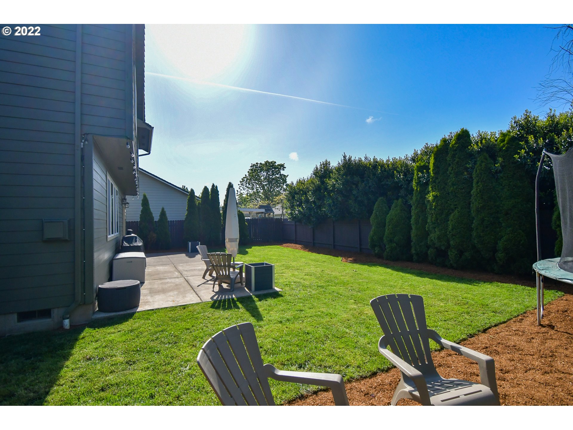 901 T Street Springfield, OR 97477 - Photo 26 of 29 a view of a backyard with sitting area