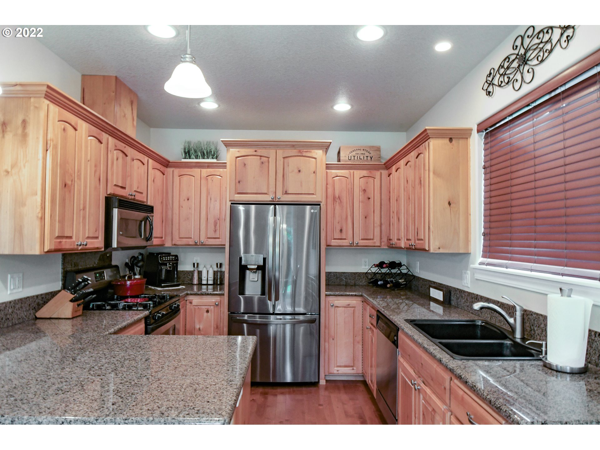 901 T Street Springfield, OR 97477 - Photo 7 of 29 a kitchen with refrigerator and cabinets