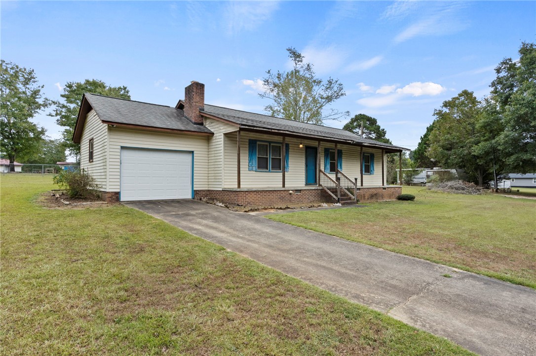 1022 Lakemont Road Starr, SC 29684 - Photo 2 of 24 An inviting front porch and attached garage define this classic ranch-style exterior.