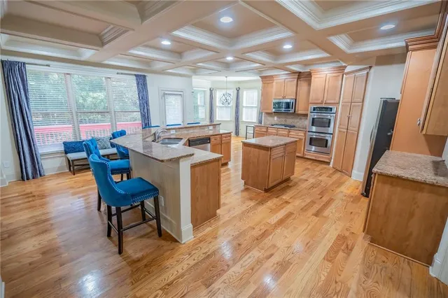 a bathroom with a sink a mirror and a shower curtain