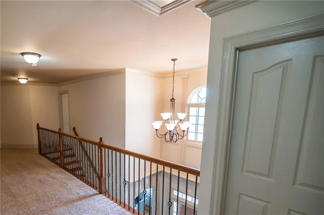 an aerial view of a house with outdoor space