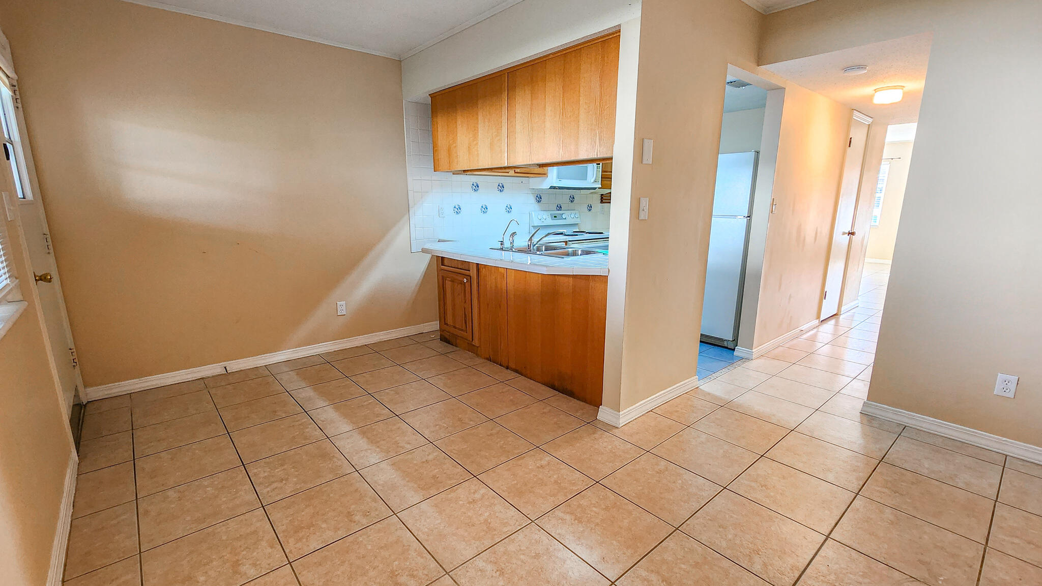 145 4th Avenue, Unit B3 Shalimar, FL 32579 - Photo 14 of 28 a view of kitchen with granite countertop cabinets and window