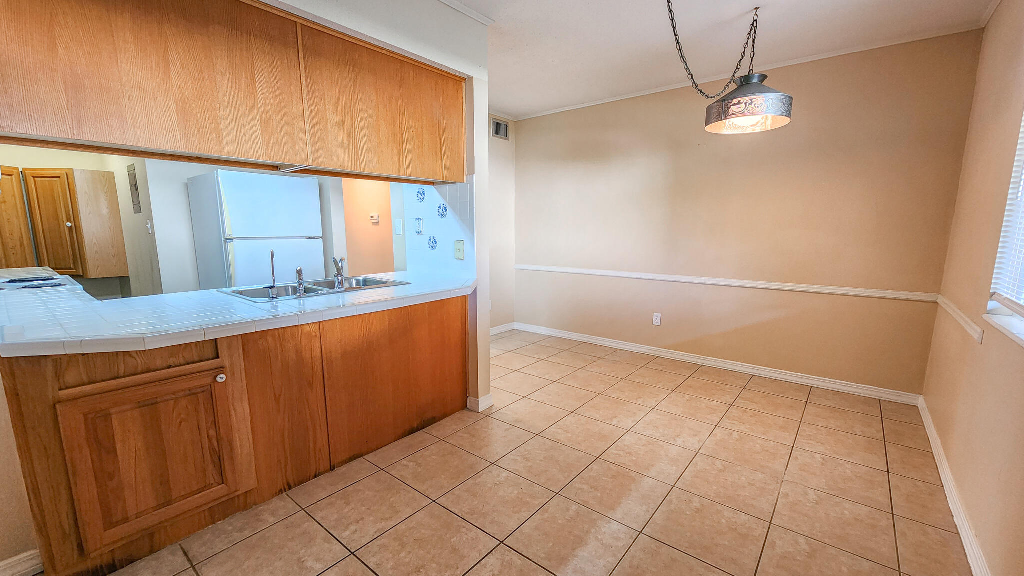 145 4th Avenue, Unit B3 Shalimar, FL 32579 - Photo 15 of 28 a bathroom with a sink a mirror and a shower