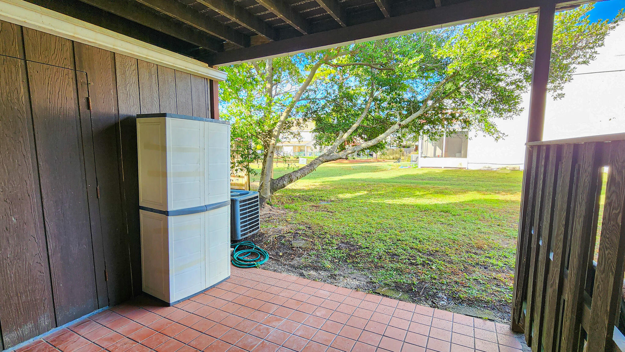 145 4th Avenue, Unit B3 Shalimar, FL 32579 - Photo 16 of 28 a view of a backyard with garden
