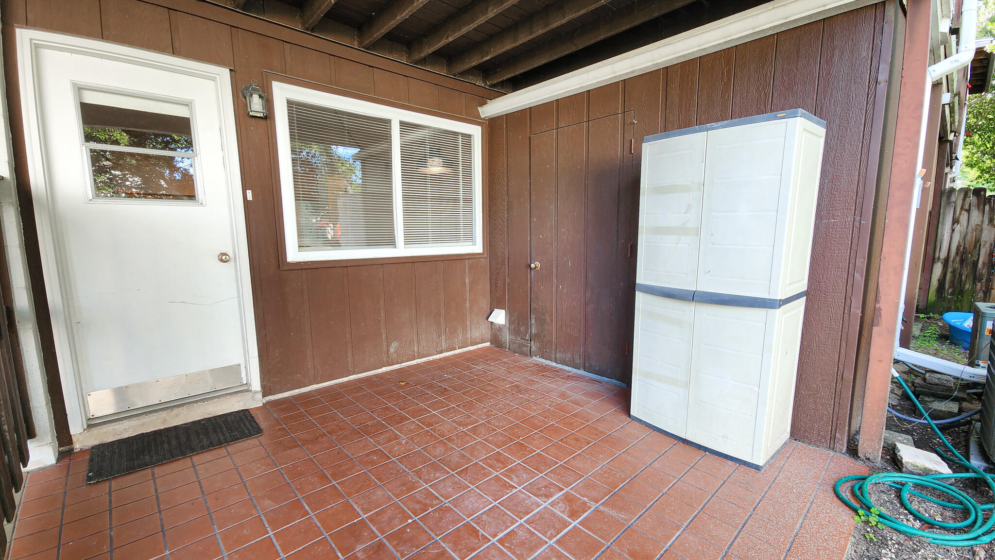 145 4th Avenue, Unit B3 Shalimar, FL 32579 - Photo 18 of 28 an empty room with wooden floor and a window