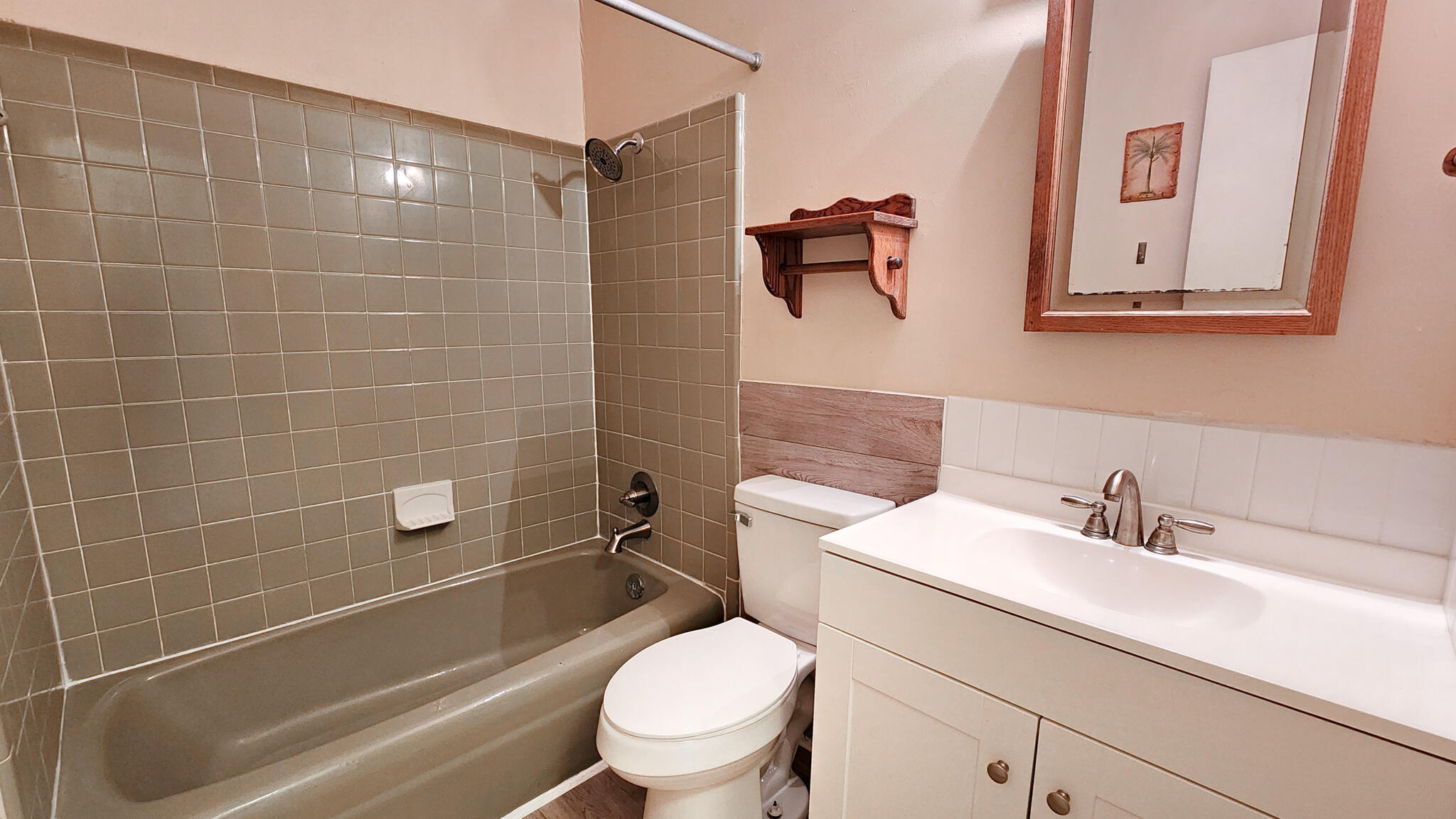 145 4th Avenue, Unit B3 Shalimar, FL 32579 - Photo 25 of 28 a bathroom with a sink a toilet and shower
