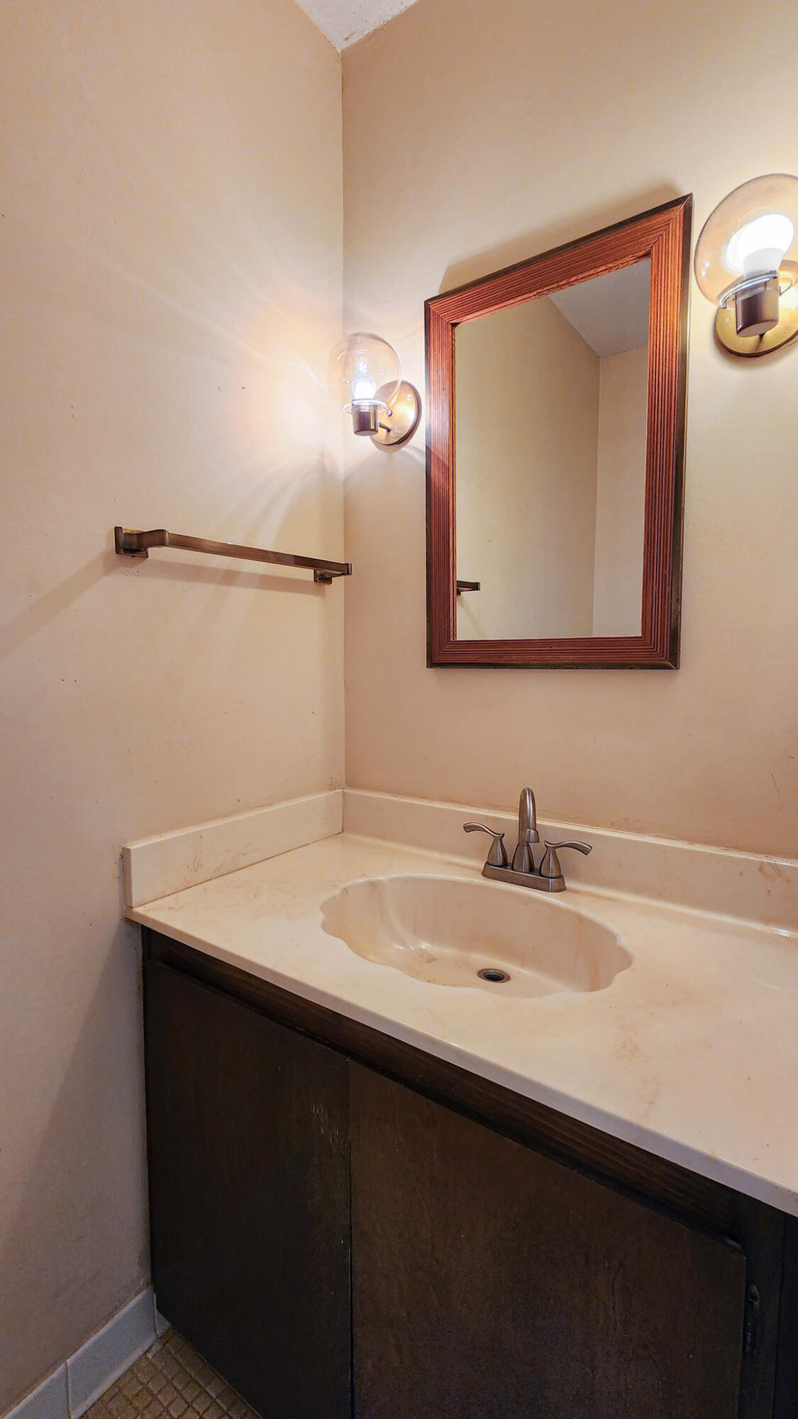 145 4th Avenue, Unit B3 Shalimar, FL 32579 - Photo 6 of 28 a bathroom with a sink and a mirror
