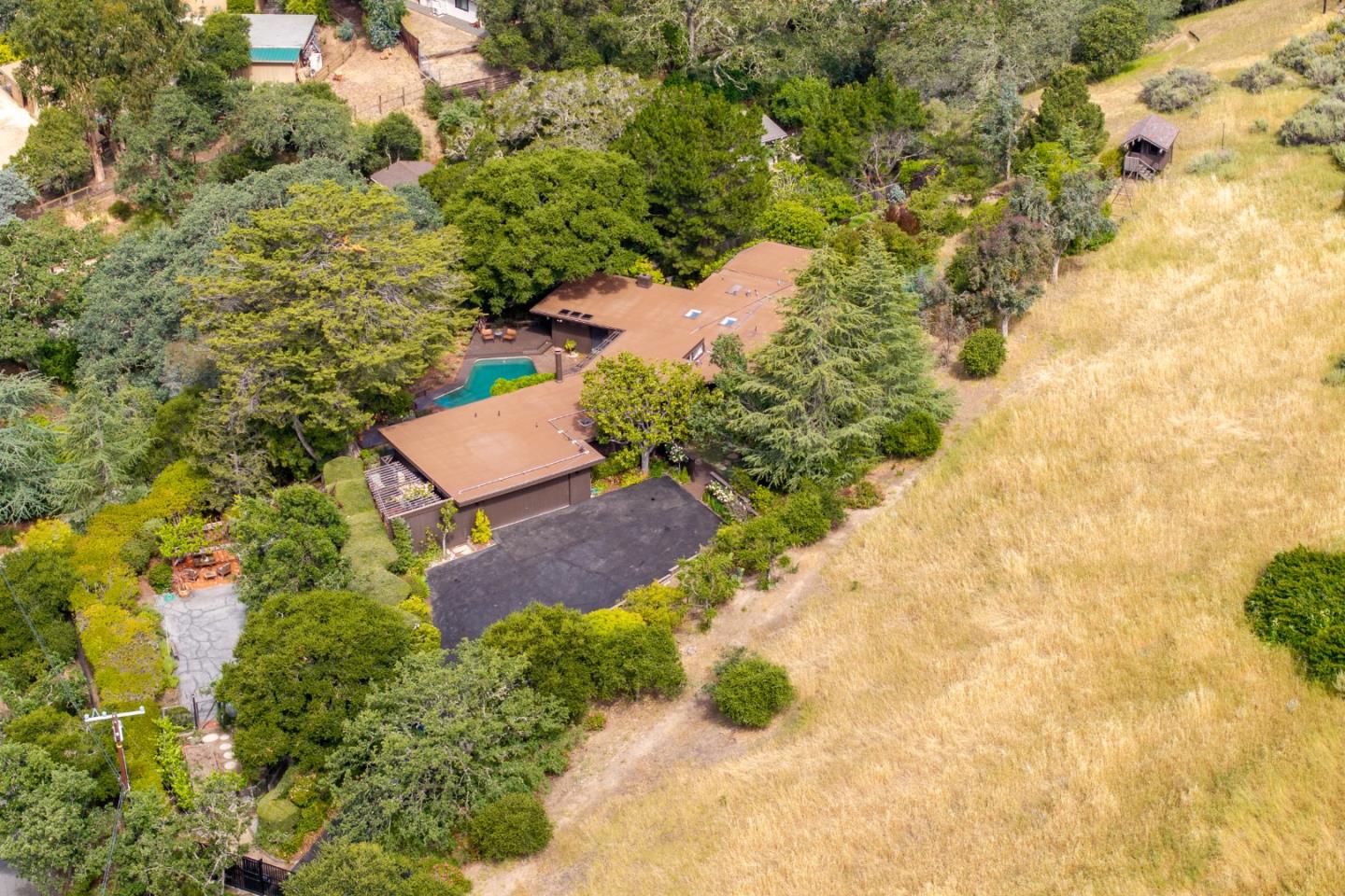 46 Middle Canyon Road Carmel Valley, CA 93924 - Photo 62 of 74 an aerial view of a house with a yard and lake view