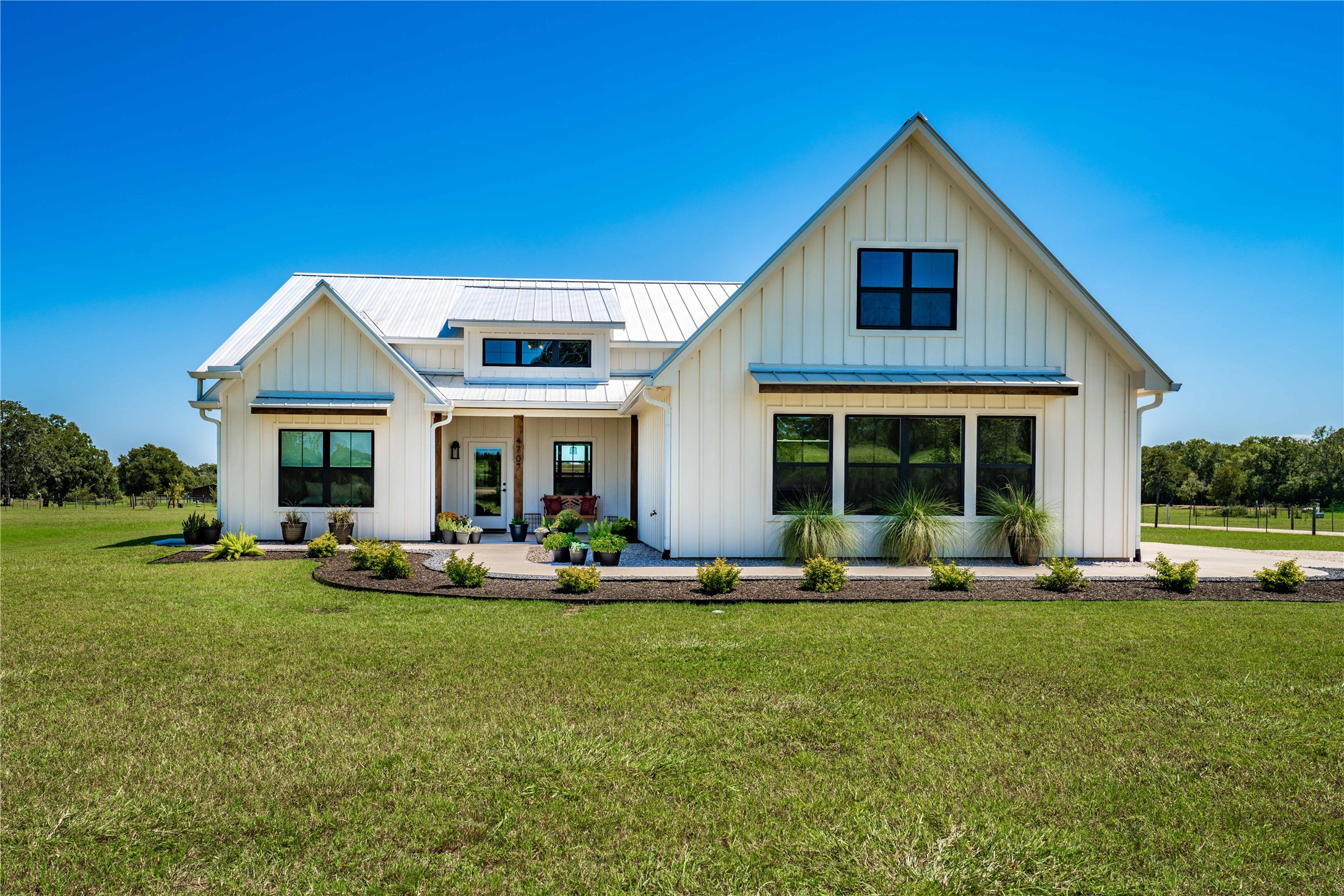 4707 Guenther Road La Grange, TX 78945 - Photo 21 of 26 a front view of a house with sitting area and garden