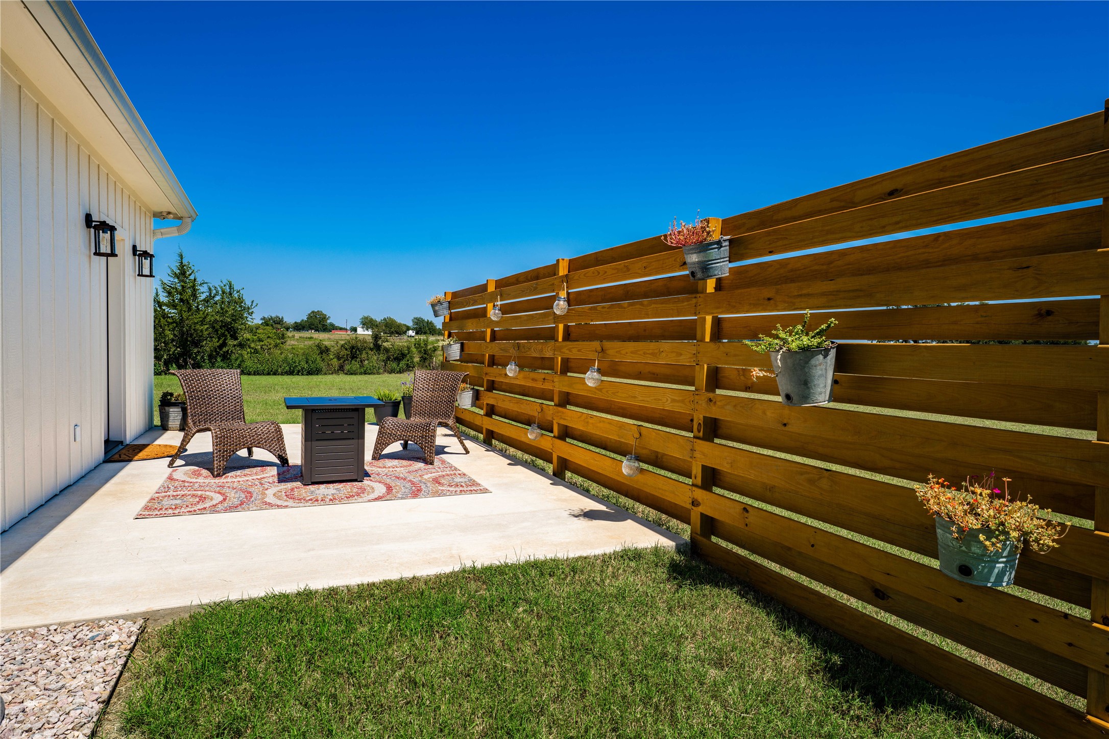 4707 Guenther Road La Grange, TX 78945 - Photo 26 of 26 a view of two chairs and table in a backyard