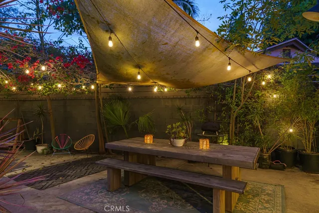 a front view of a house with a yard and a garage