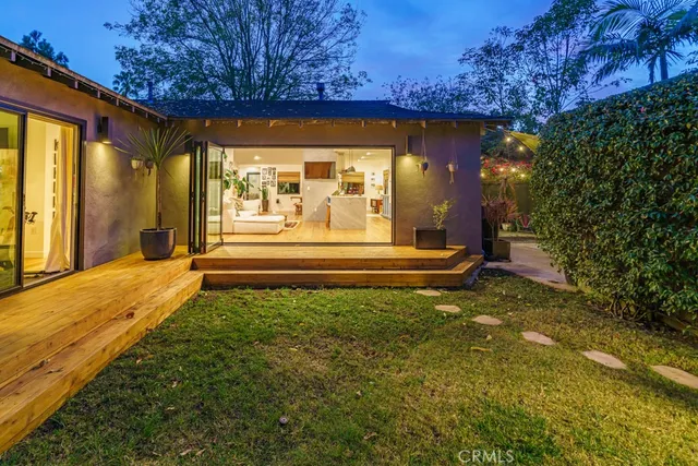 a view of kitchen with granite countertop stove and wooden floor