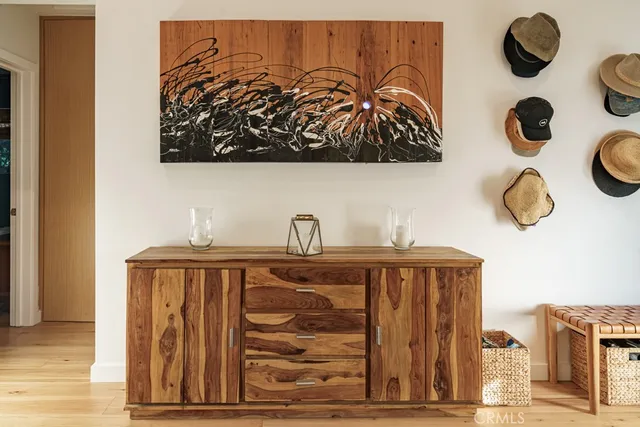 a bedroom with furniture and a chandelier