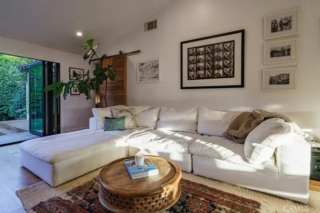 a bathroom with a toilet a sink and a mirror