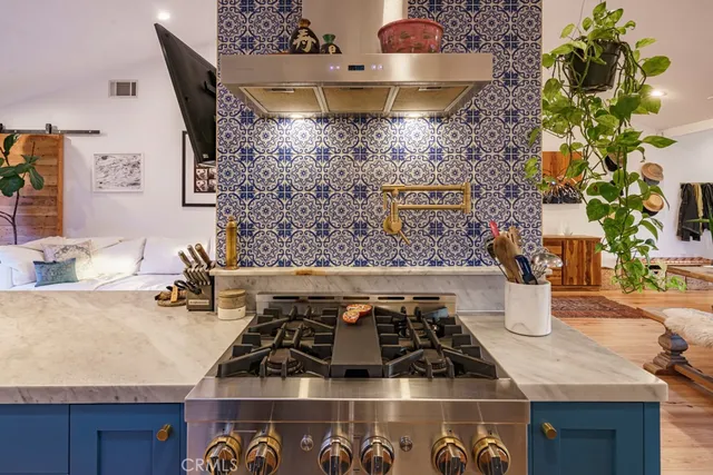 a bathroom with a double vanity sink mirror and toilet