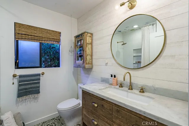 a view of a backyard with a garden and plants