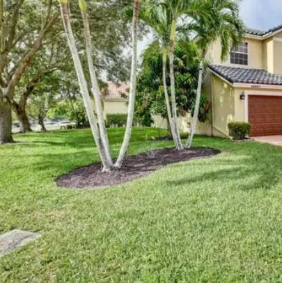 a living room with furniture fireplace and a flat screen tv