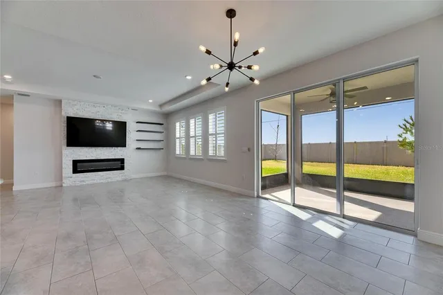 a kitchen with granite countertop a sink stainless steel appliances and cabinets