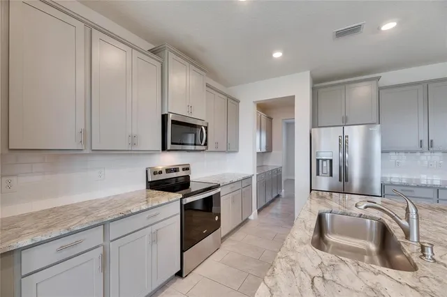 a view of cabinets with wooden floor