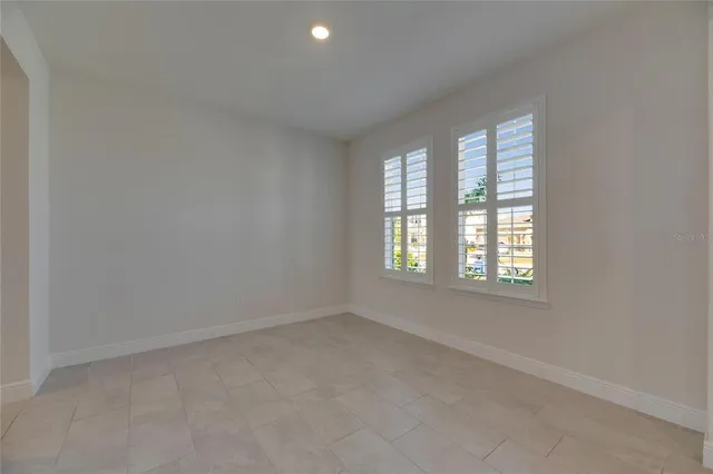 a kitchen with stainless steel appliances a refrigerator sink and stove