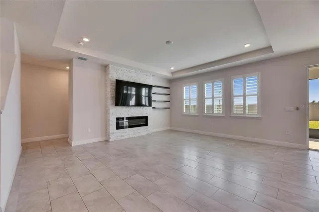 a view of a kitchen with a sink and cabinets