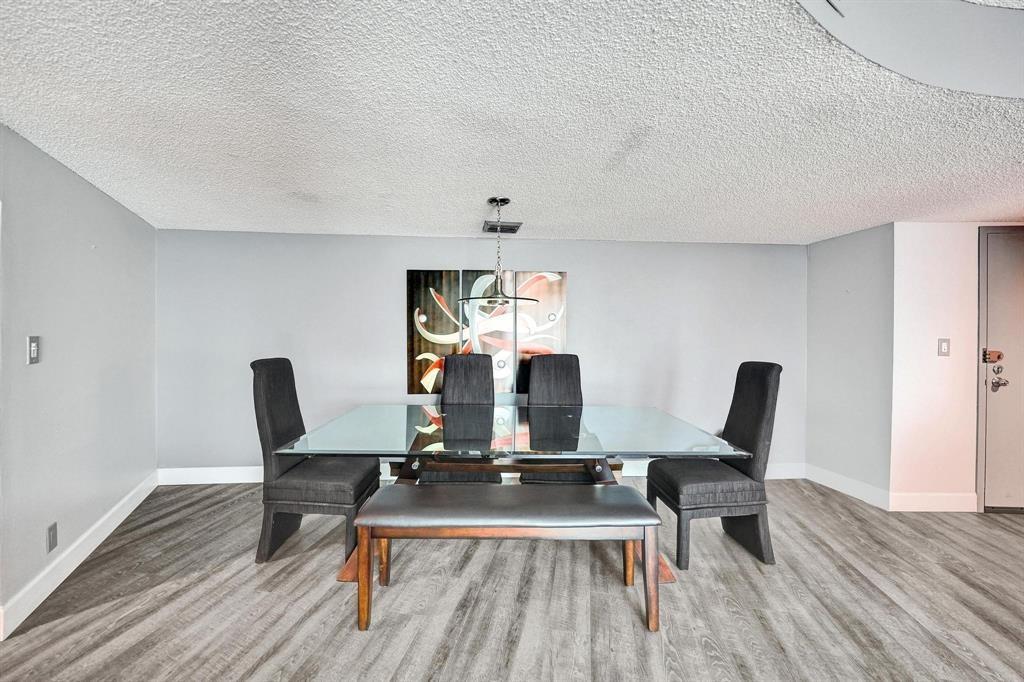 100 Golden Isles Drive, Unit 815 Hallandale Beach, FL 33009 - Photo 18 of 42 a view of a workspace with furniture and a window