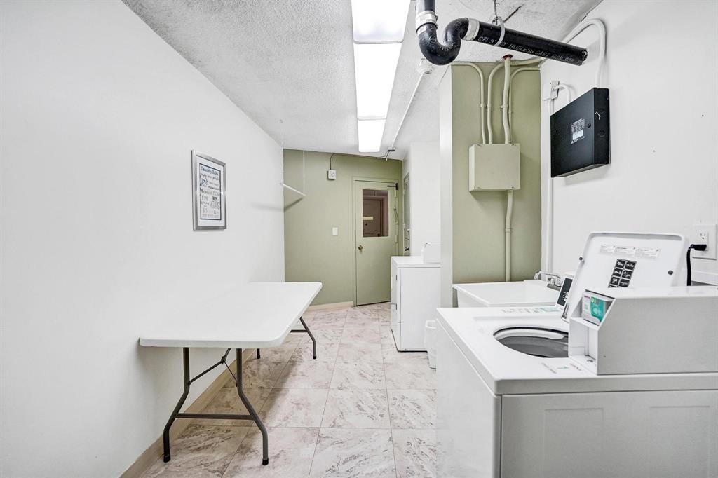 100 Golden Isles Drive, Unit 815 Hallandale Beach, FL 33009 - Photo 36 of 42 a bathroom with a sink a toilet and mirror