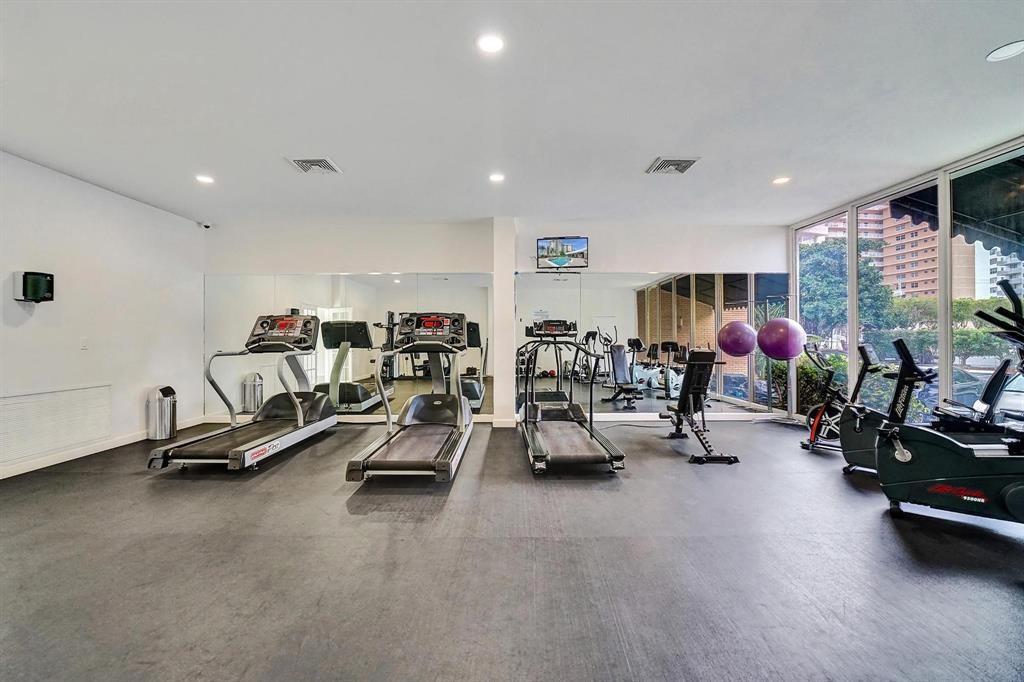 100 Golden Isles Drive, Unit 815 Hallandale Beach, FL 33009 - Photo 37 of 42 a view of a room with gym equipment