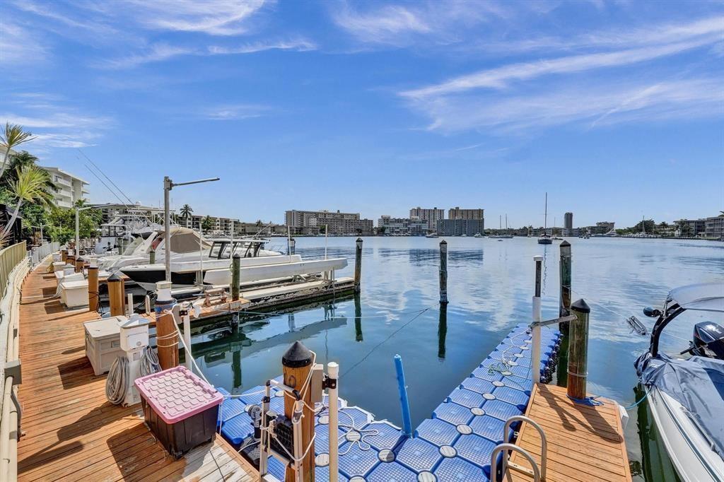 100 Golden Isles Drive, Unit 815 Hallandale Beach, FL 33009 - Photo 41 of 42 a view of a terrace with chairs