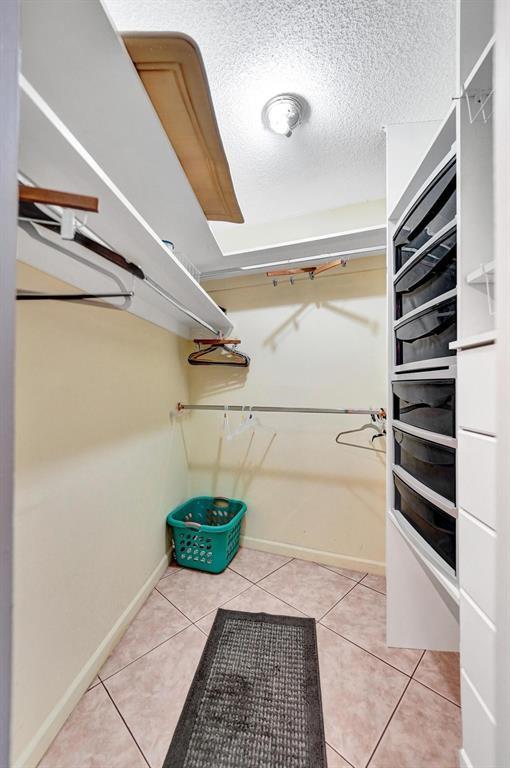 100 Golden Isles Drive, Unit 815 Hallandale Beach, FL 33009 - Photo 10 of 42 a view of walk in closet
