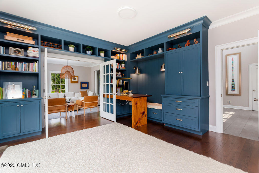 552 River Road Cos Cob, CT 06807 - Photo 13 of 35 a living room with furniture and a wooden floor