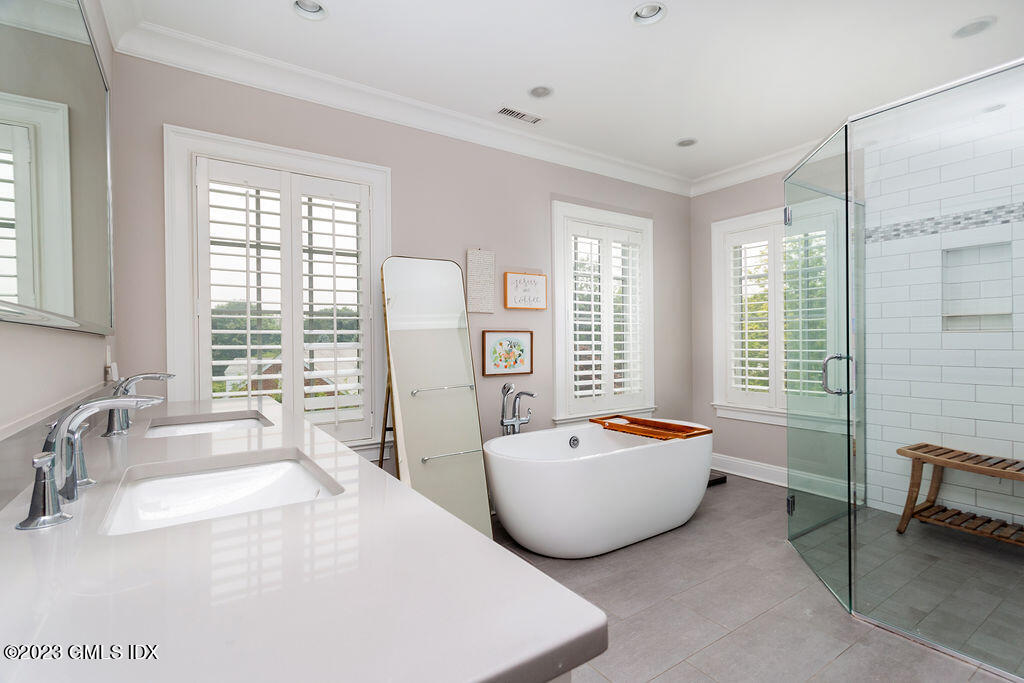 552 River Road Cos Cob, CT 06807 - Photo 19 of 35 a living room with furniture and windows