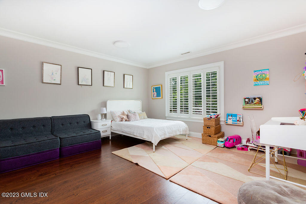 552 River Road Cos Cob, CT 06807 - Photo 22 of 35 a living room with furniture and a window