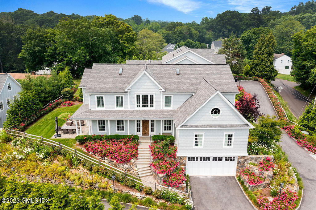 552 River Road Cos Cob, CT 06807 - Photo 31 of 35 an aerial view of residential houses and car parked