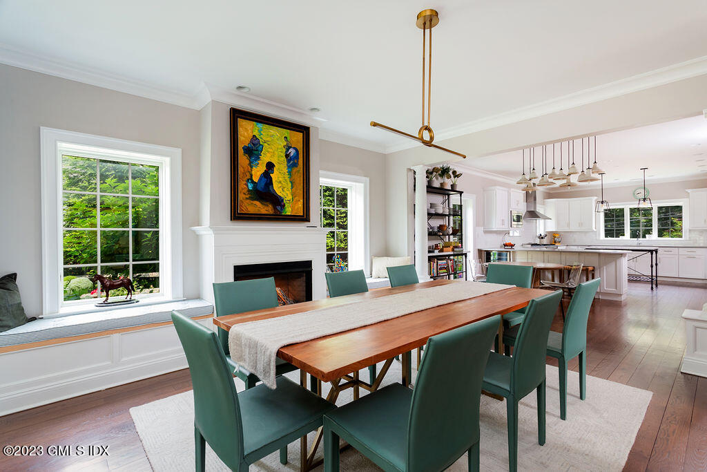 552 River Road Cos Cob, CT 06807 - Photo 8 of 35 a outdoor dining space with furniture and window