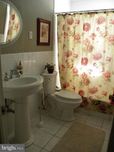 1621 Landon Road Towson, MD 21204 - Photo 5 of 8 Updated Hall Bath with Ceramic Tile Floor