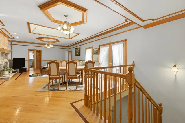 a view of a livingroom with furniture and a window